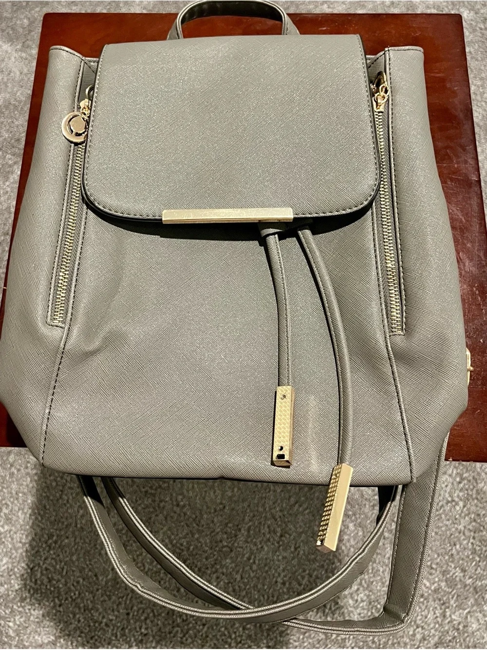 Sleek Backpack Purse with Gold Hardware
